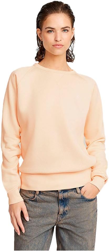 Pavo Monitor Arm installed on a wooden office desk