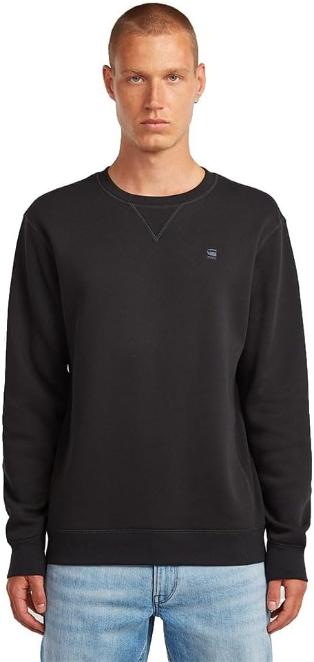 Pavo Monitor Arm installed on a wooden office desk